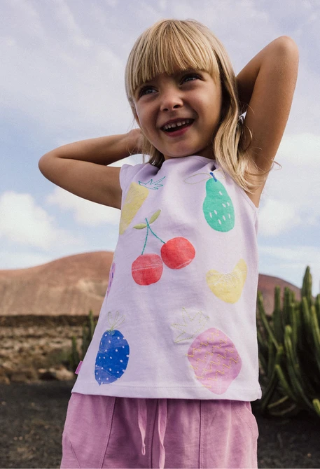Maglietta a maglia per neonata in colore bianco con stampa di frutti