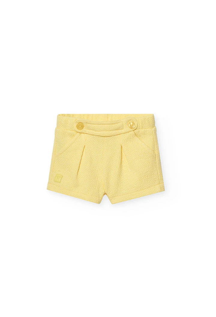 Pantaloncini in maglia per neonata in colore giallo