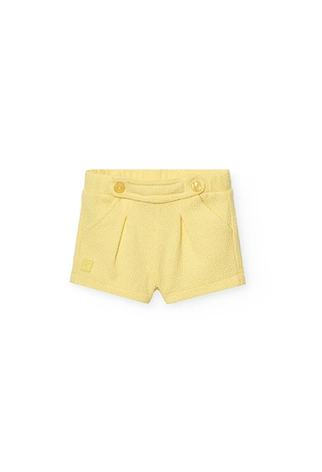 Pantaloncini in maglia per neonata in colore giallo