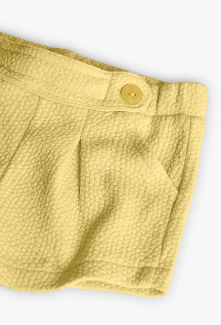 Shorts de punto para bebé niña en color amarillo