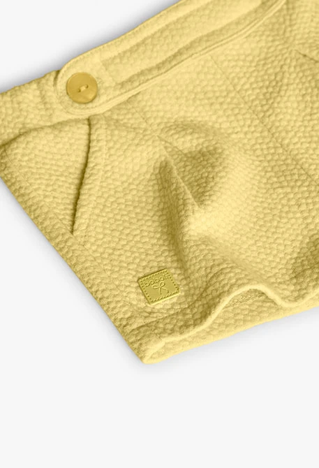Shorts de punto para bebé niña en color amarillo
