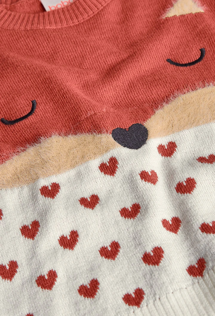 Orangefarbener Mädchenpullover mit Tier