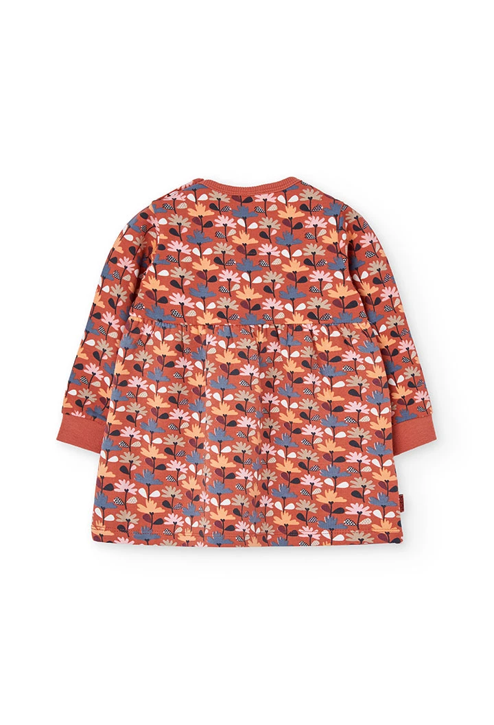 Robe orange à fleurs