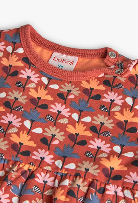 Robe orange à fleurs