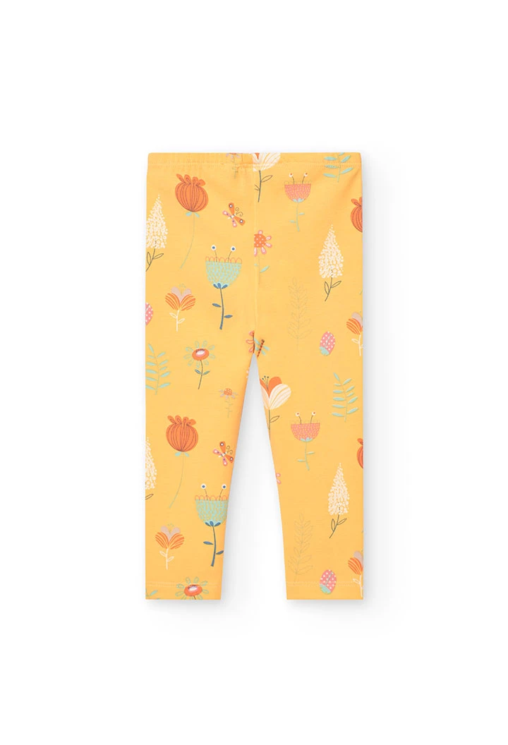 Knitted leggings for baby girl in yellow with print