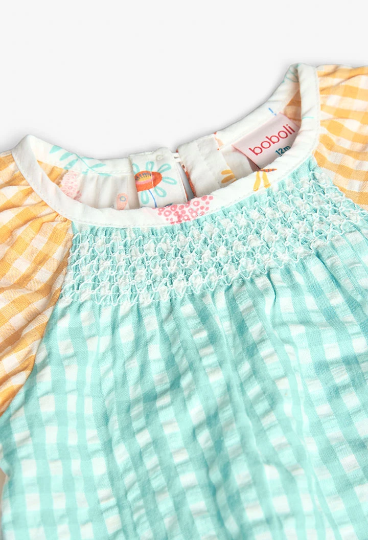 Blouse en popeline pour bébé fille avec motif à carreaux multicolores.