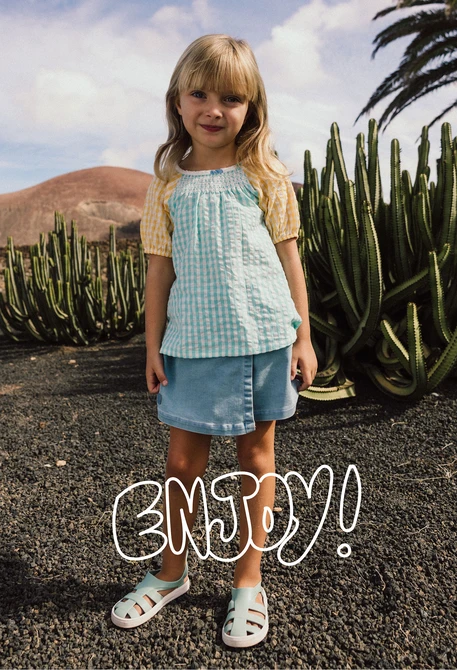 Gonna-pantaloncino in denim per neonata in colore bleach