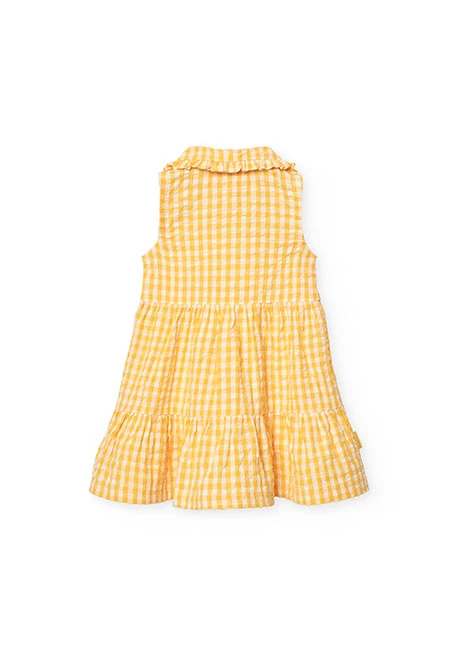 Baby girl\'s poplin dress with a yellow check pattern.