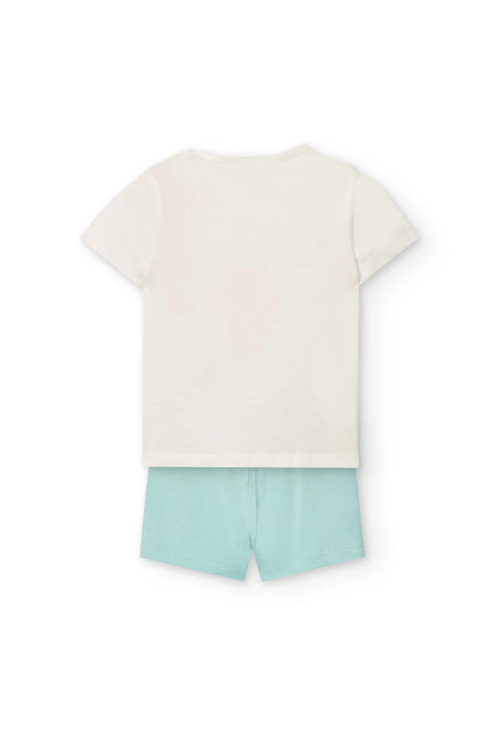 Completo di maglietta e pantaloncini a maglia per neonata di colore bianco.