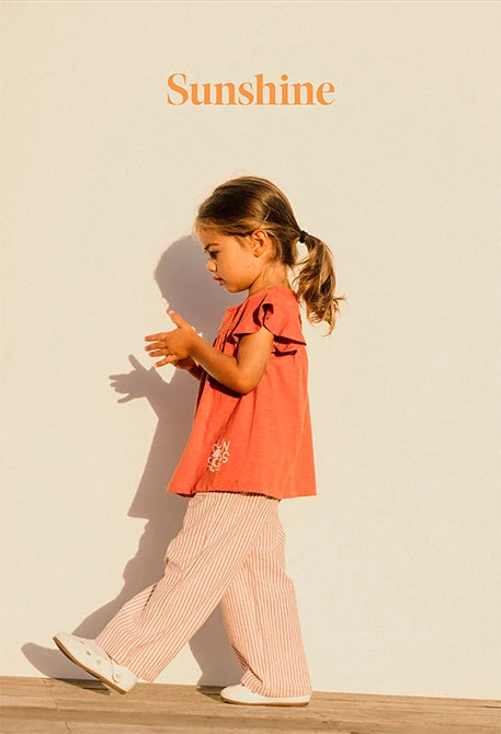 Pantalone in popeline per bambino a righe arancioni e bianche