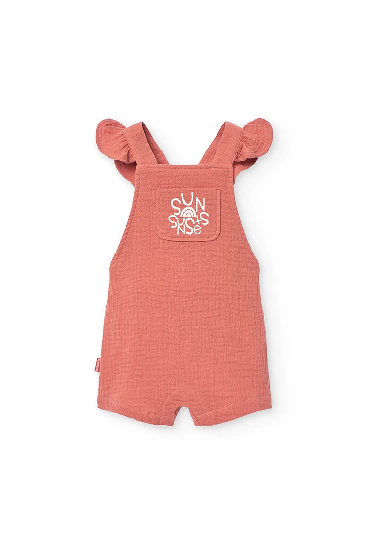 Pagliaccetto a maglia per bambina in colore arancione.