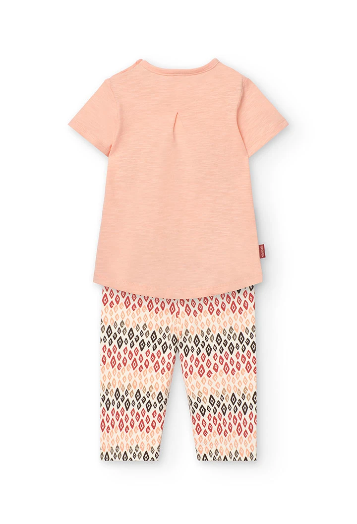Set composto da maglietta e pantalone a maglia per neonata in colore salmone.