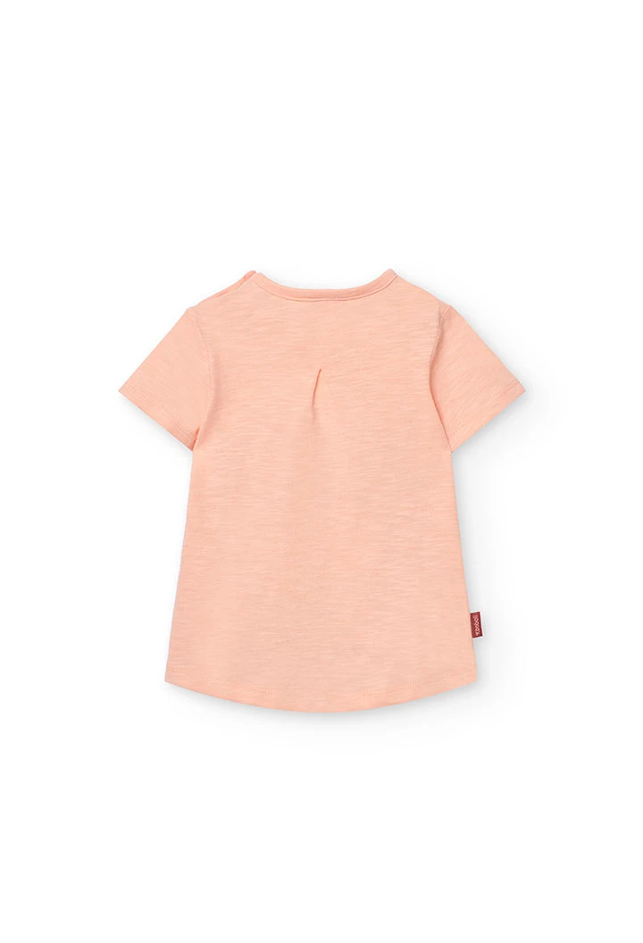 Set composto da maglietta e pantalone a maglia per neonata in colore salmone.