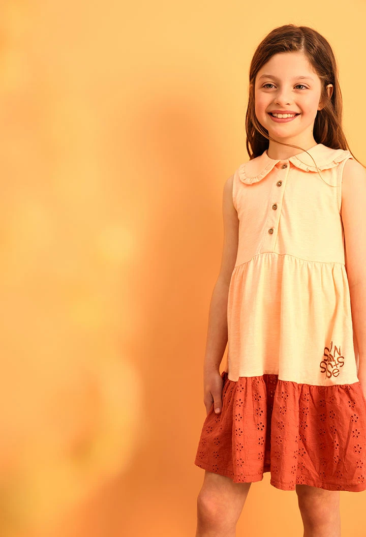 Robe en maille pour bébé fille couleur saumon avec design flammé.
