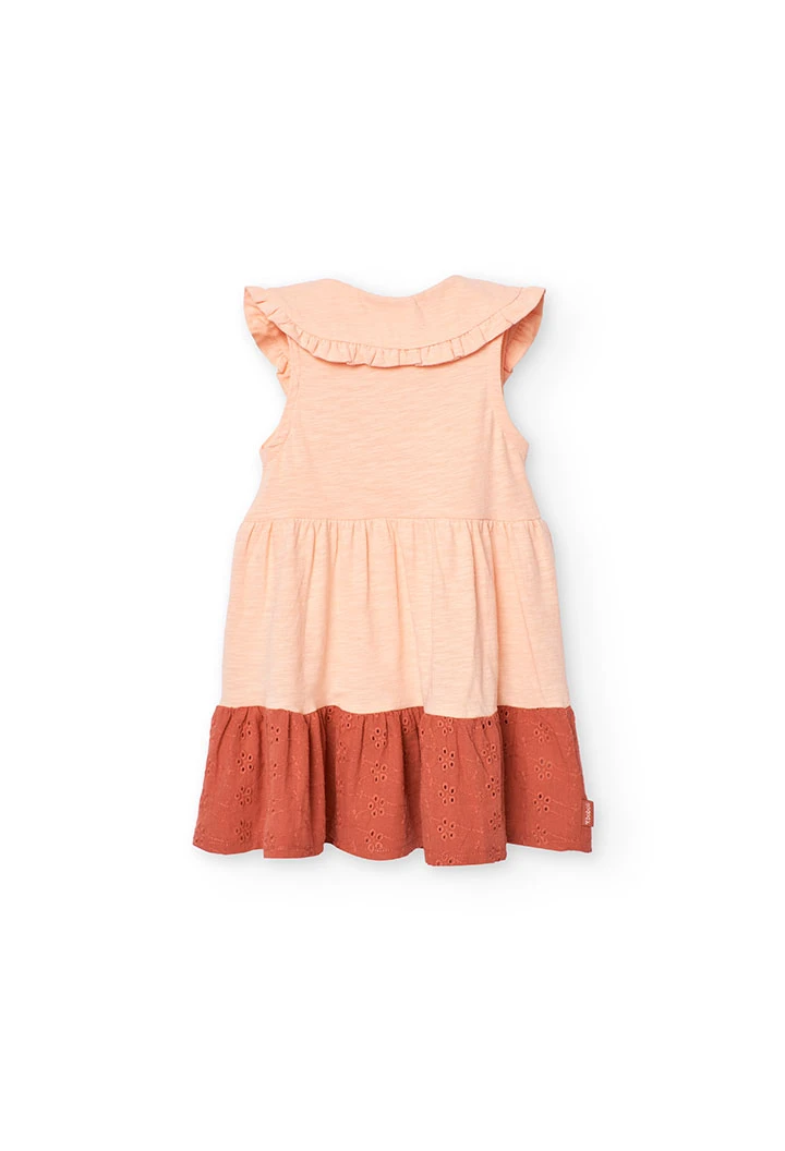 Vestido de malha para bebé menina em cor salmão com design flamê.