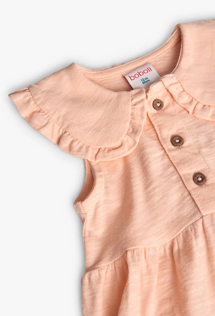 Vestido de malha para bebé menina em cor salmão com design flamê.