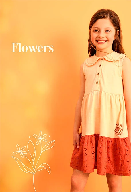 Robe en maille pour bébé fille couleur saumon avec design flammé.