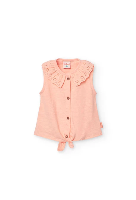 Maglietta di maglia per bebè femmina in colore salmone con dettaglio di pizzo.