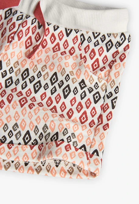 Calções de tricô para bebé menina com estampado multicolor.