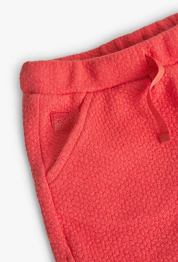 Pantaloncini in jersey rilievo da neonata rossi