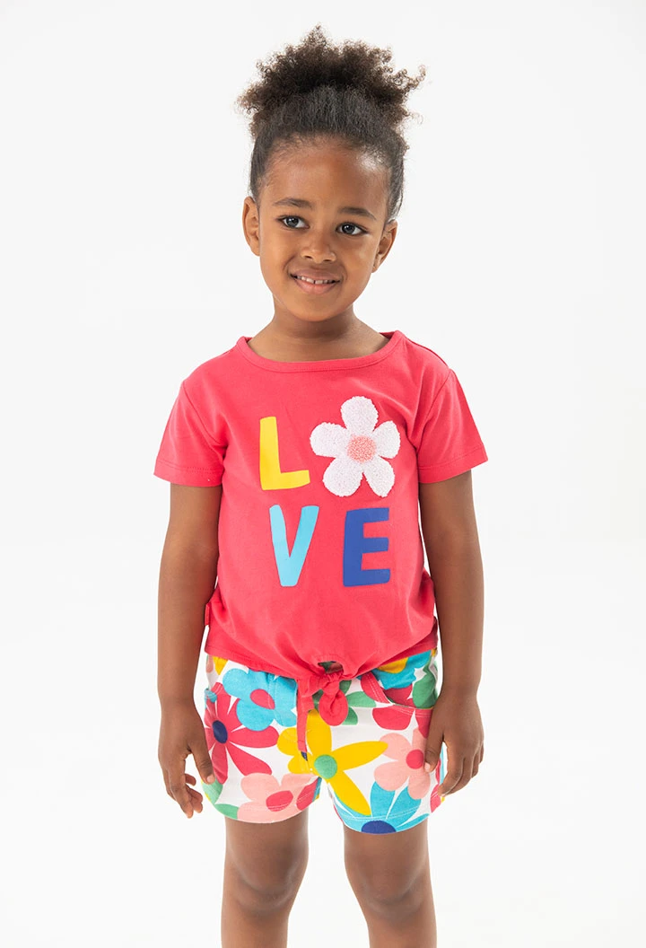 T-shirt en maille pour bébé fille couleur fraise avec imprimé.