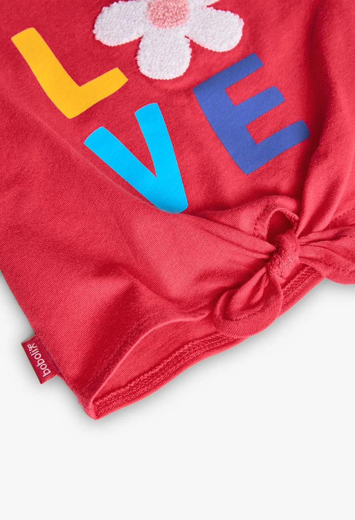 T-shirt en maille pour bébé fille couleur fraise avec imprimé.