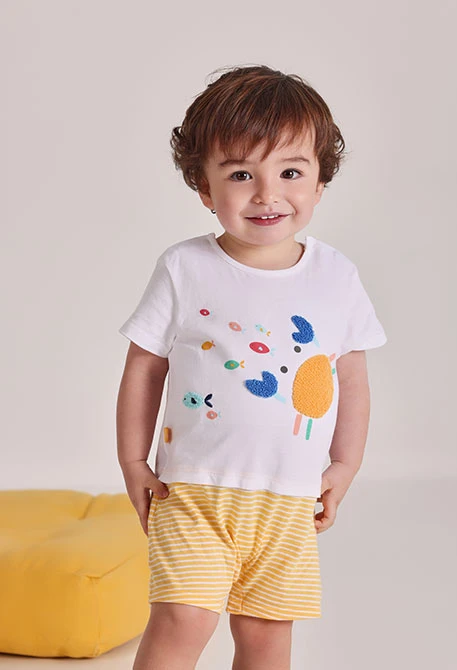 Baby white cotton playsuit