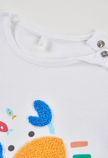 Baby white cotton playsuit