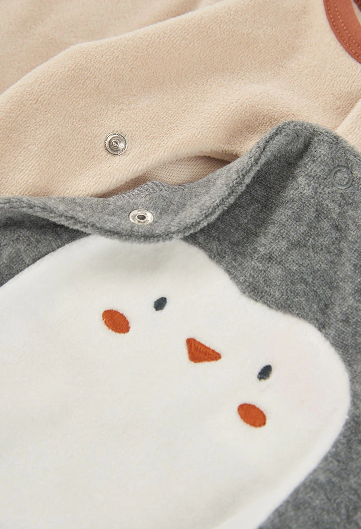 Beige Baby-Strampler mit Pinguin-Aufdruck