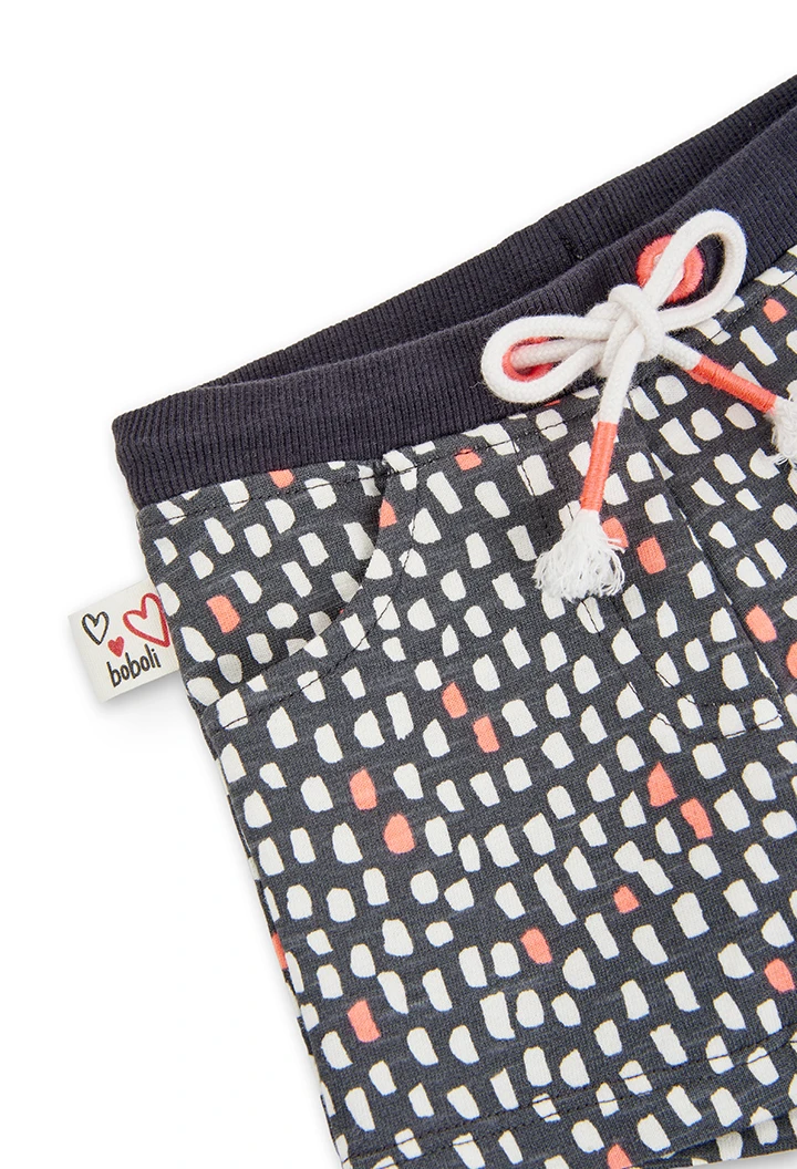Short pelfa nadó nena estampat amb taquetes