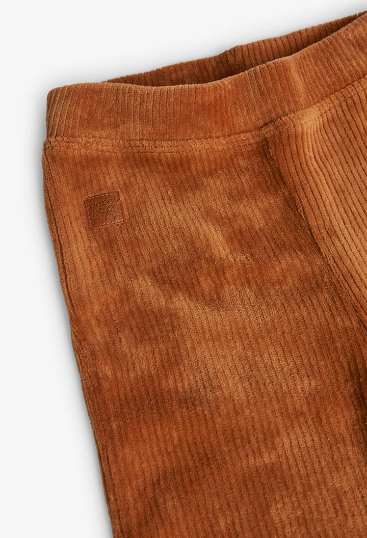 Corduroy trousers for baby girl in orange