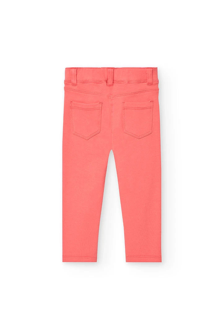Baby girl\'s plush trousers in red.
