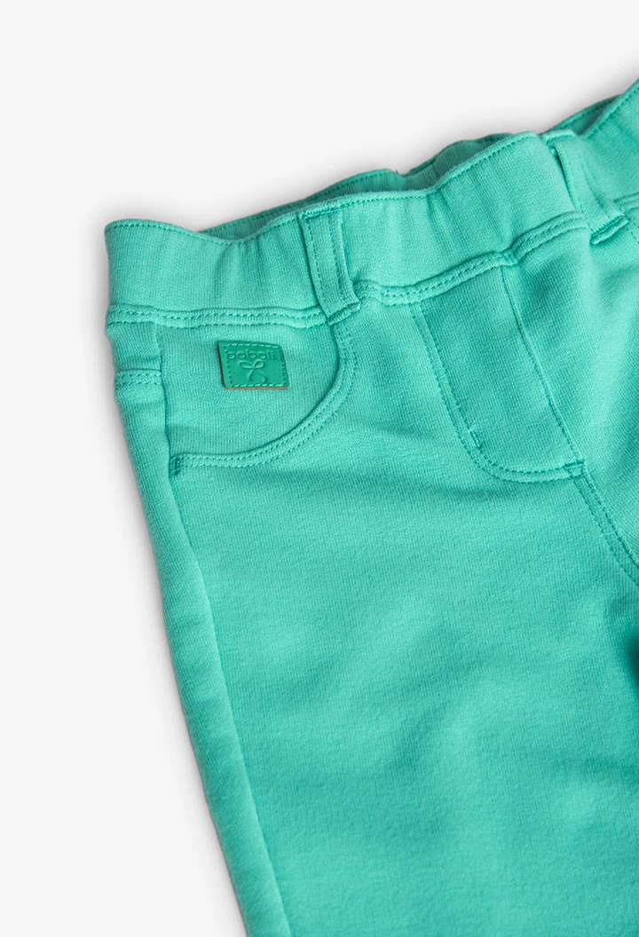 Pantalone base in maglia per bambina in colore verde