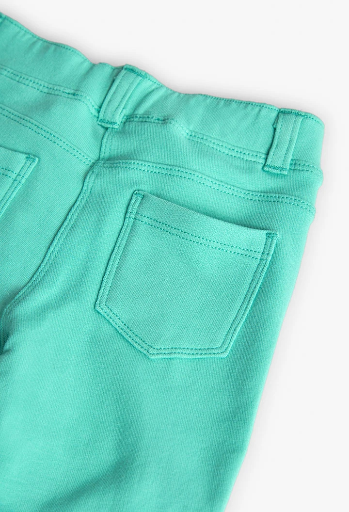 Pantalone base in maglia per bambina in colore verde