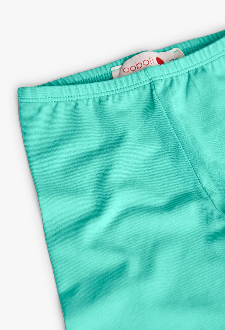 Leggings a maglia per bambina in colore verde.