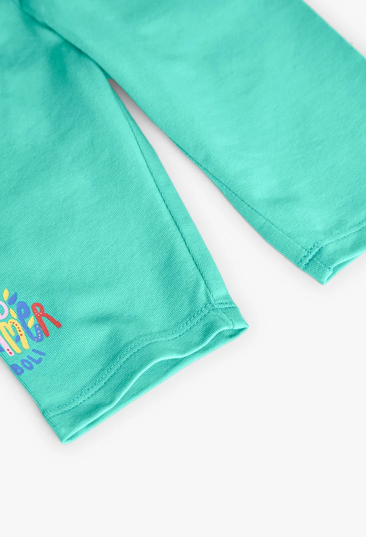 Leggings a maglia per bambina in colore verde.