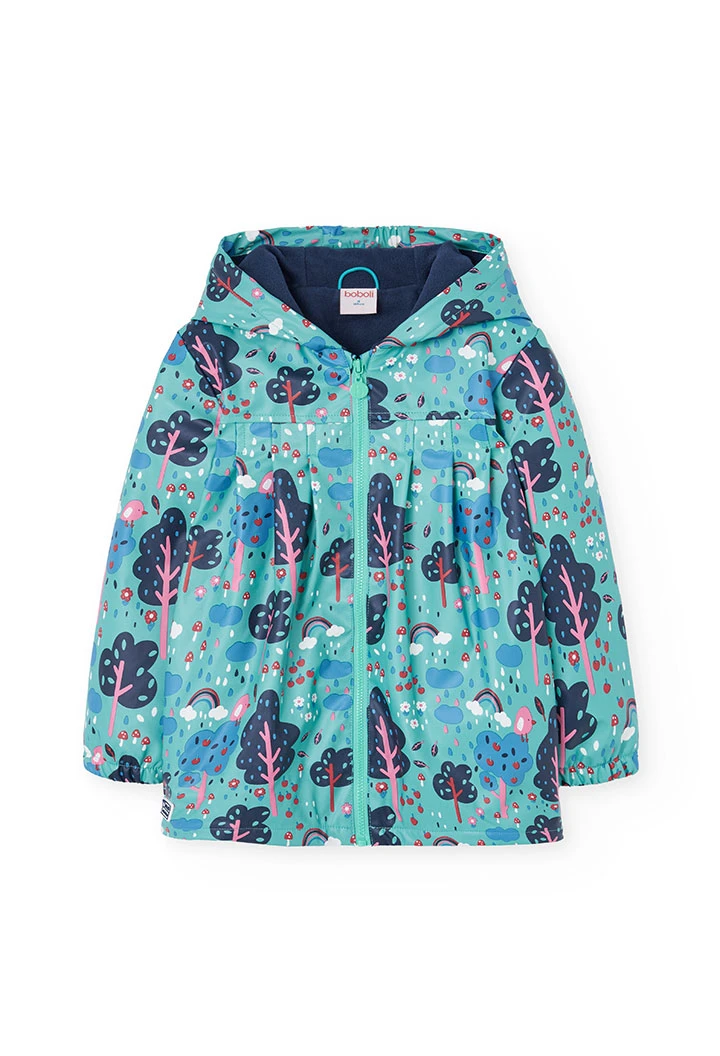 Manteau imperméable vert et bleu arbres et des nuages