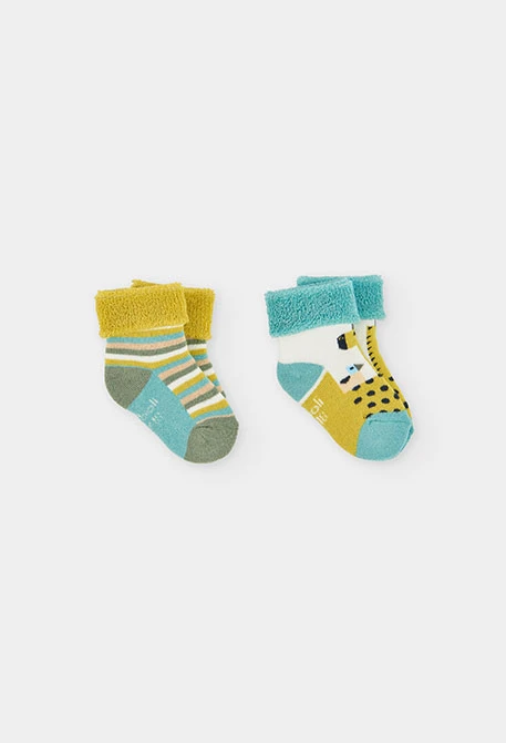 Pack of white baby socks with giraffe print