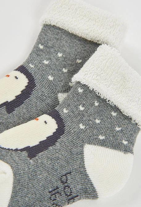 Pack mitjons nadó gris vigoré amb pingüí