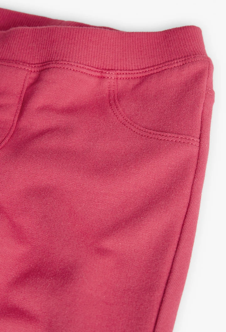 Elastic plush trousers for baby girl in red