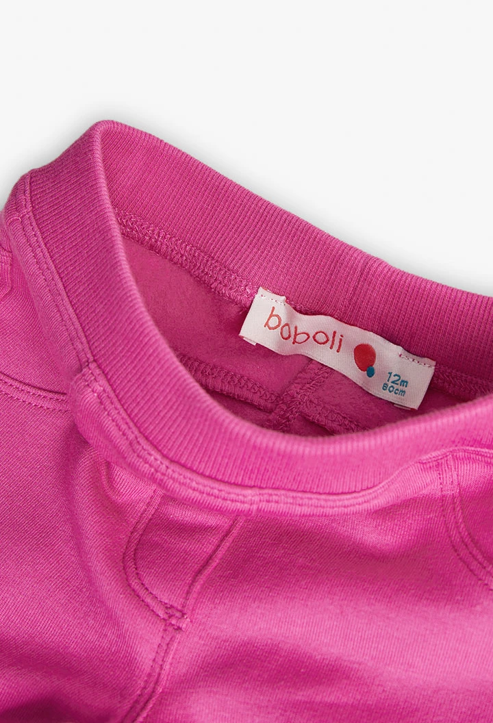 Pantalone in felpa elastica per neonato in rosa