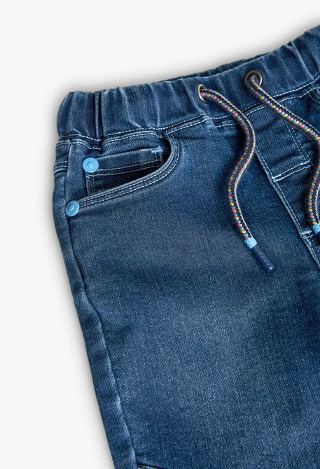 Baby boy knitted denim trousers in blue.