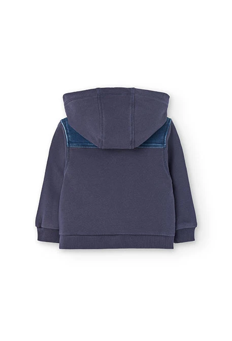 Giubbino denim in maglia per neonato di colore blu con cappuccio.