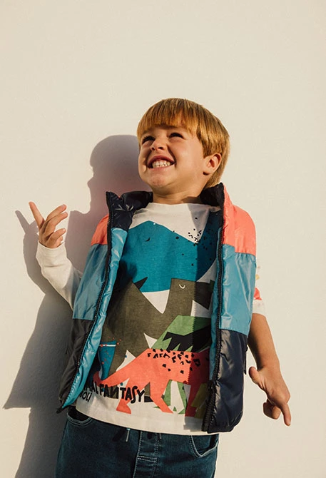 Reversible gilet for baby boy in navy blue.