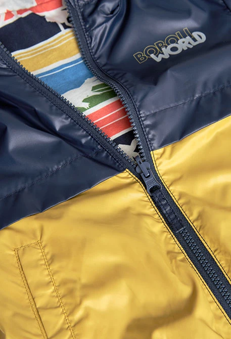 Parka reversível para bebé menino em cor mostarda e preta com estampado