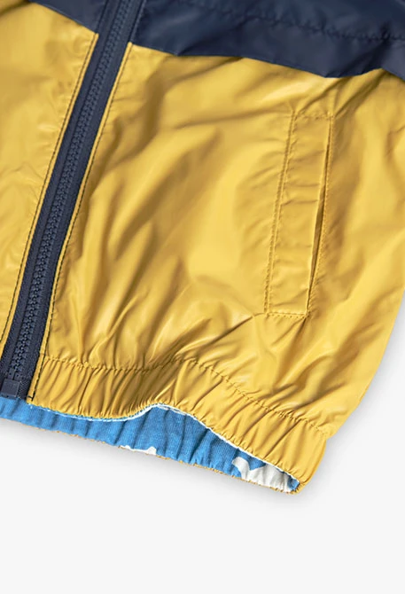Parka reversível para bebé menino em cor mostarda e preta com estampado
