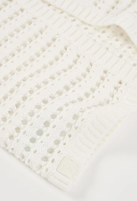 Girl?s white cotton waistcoat