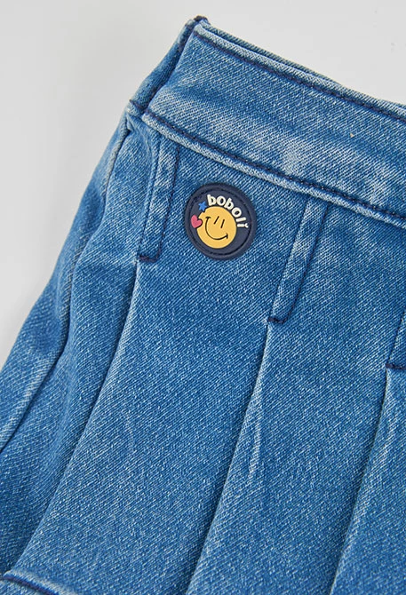 Faldilla denim blava amb botons