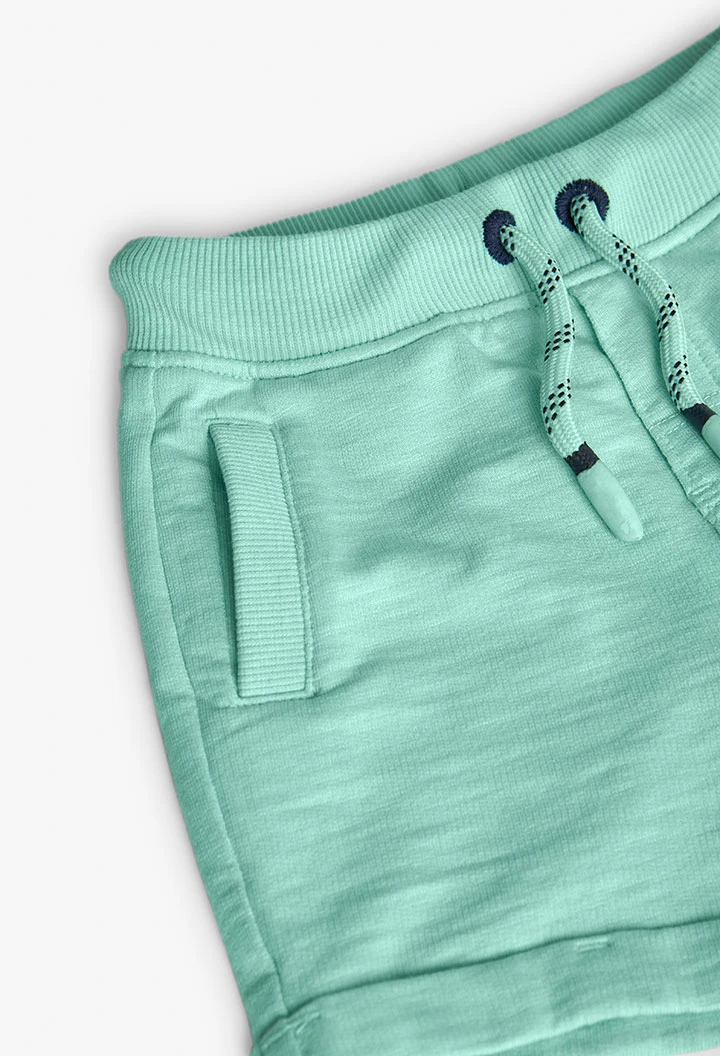 Bermuda a maglia per bambino in colore verde
