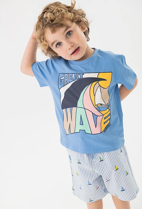 T-shirt in maglia per bambino in colore azzurro.